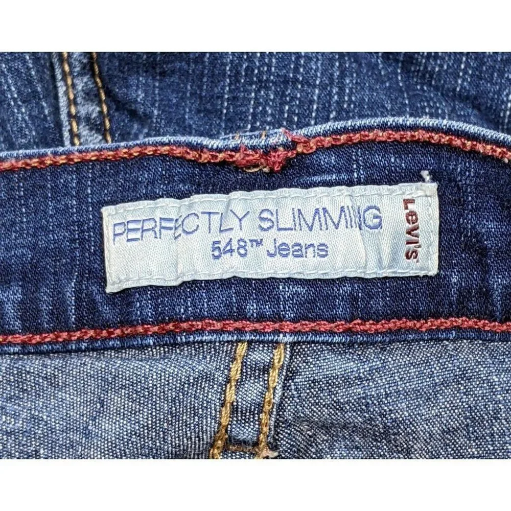 (3/$35)Levis 548 Size 4 Perfectly Slimming Fringe Hem Stretchy Denim Jean Shorts